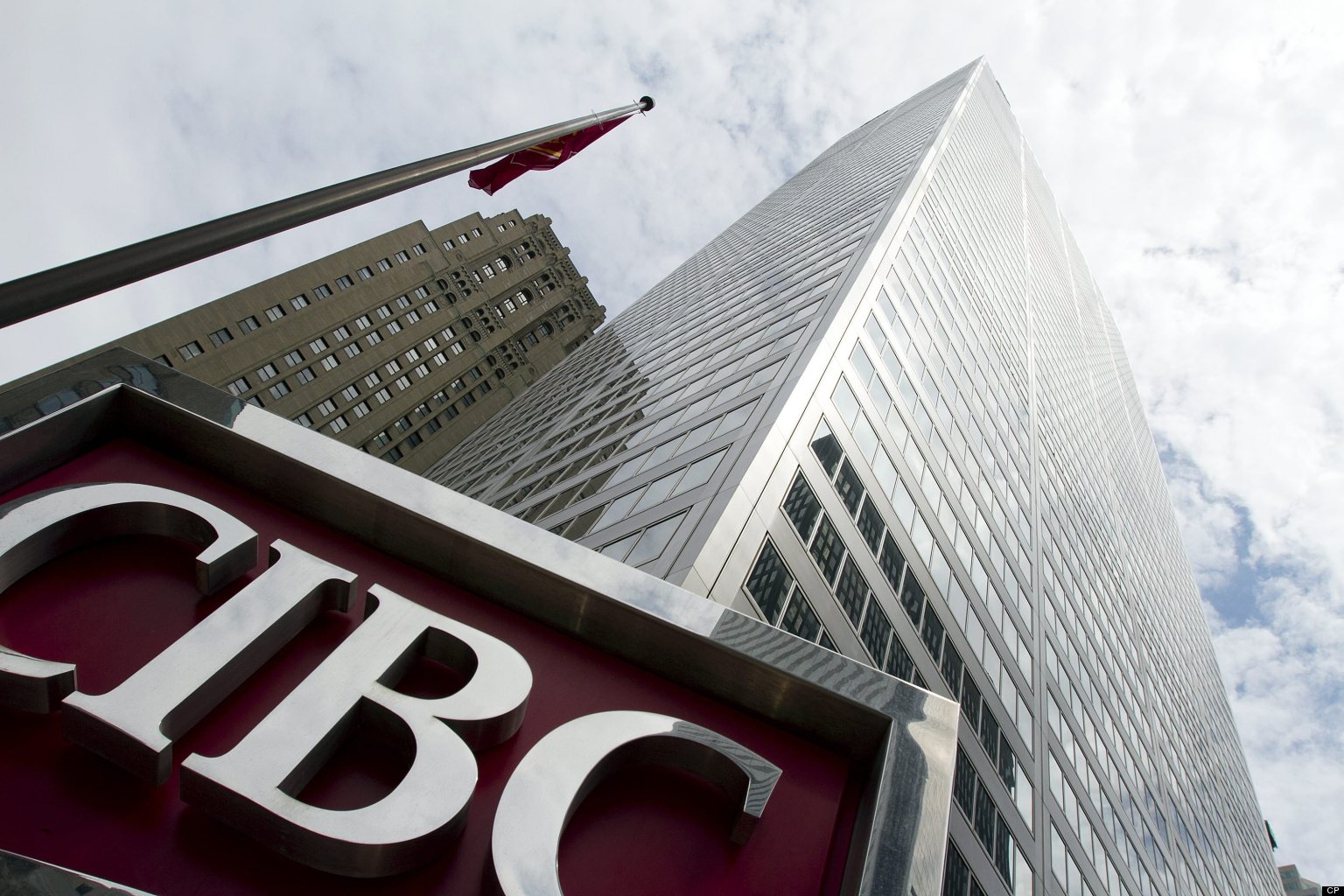 A CIBC sign sits outside the main branch in downtown Toronto, Ontario on May 29, 2012. THE CANADIAN PRESS IMAGES/Lars Hagberg